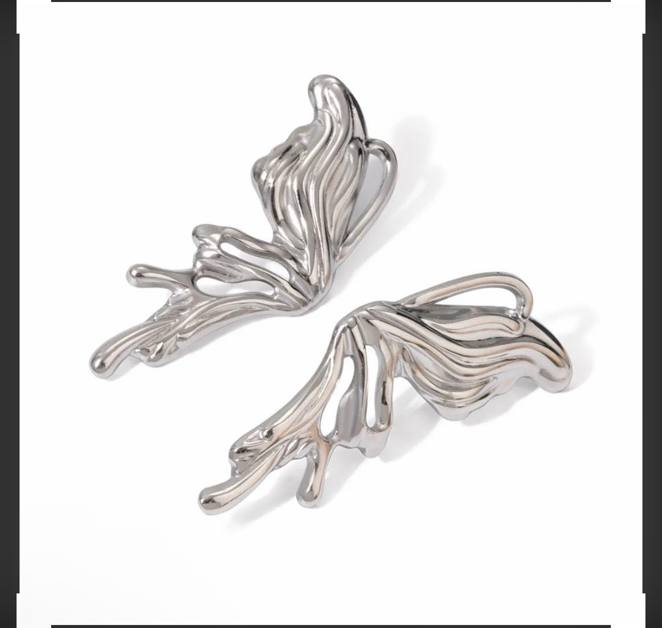 Chrome heart butterfly earrings