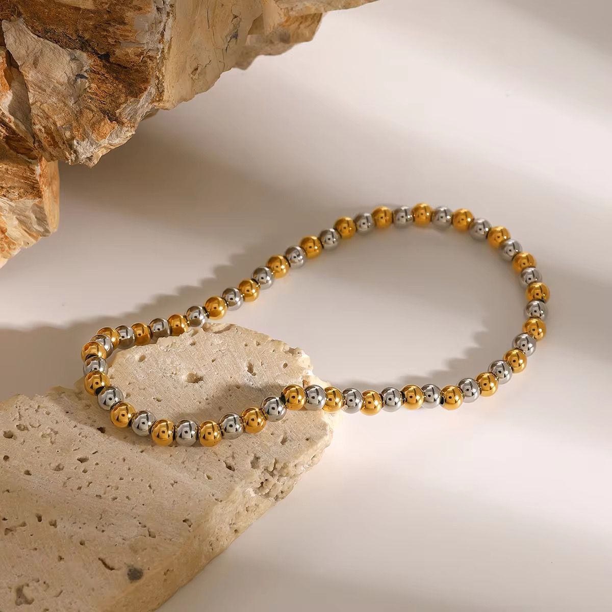 Mixed metal elastic bracelet