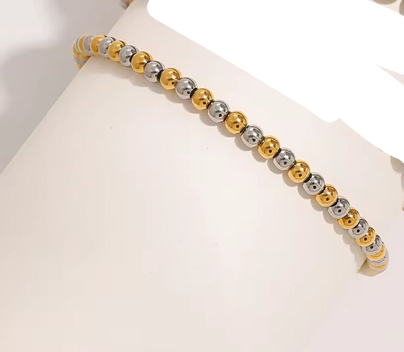 Mixed metal elastic bracelet